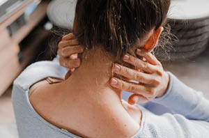 Neurologist discussing chronic headache treatment options