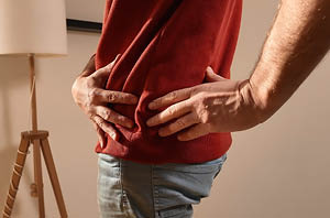 Doctor reviewing symptoms of a mini-stroke with patient