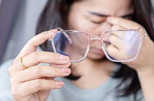 Person experiencing seizure warning signs in daily life